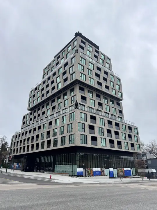 Alma: high-rise exterior cladding in Vancouver, BC by L2 Group — WFHF-12 stone-look panels