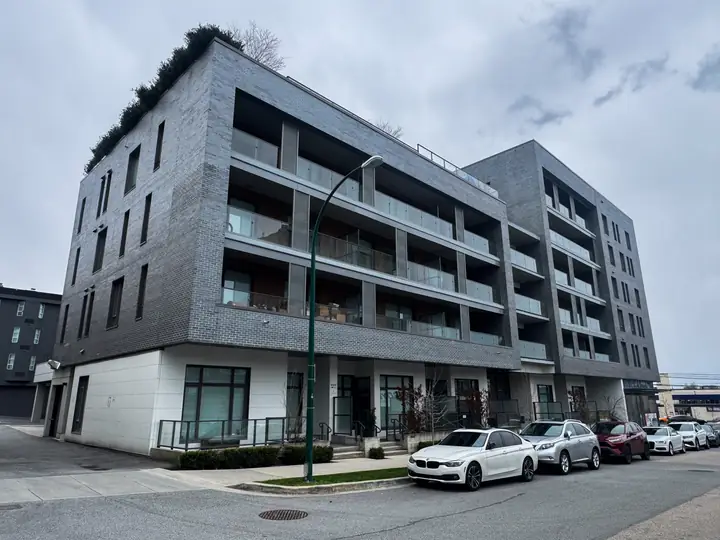 Osler: mid-rise exterior cladding in Vancouver, BC by L2 Group — Nichiha panels & rolled metal